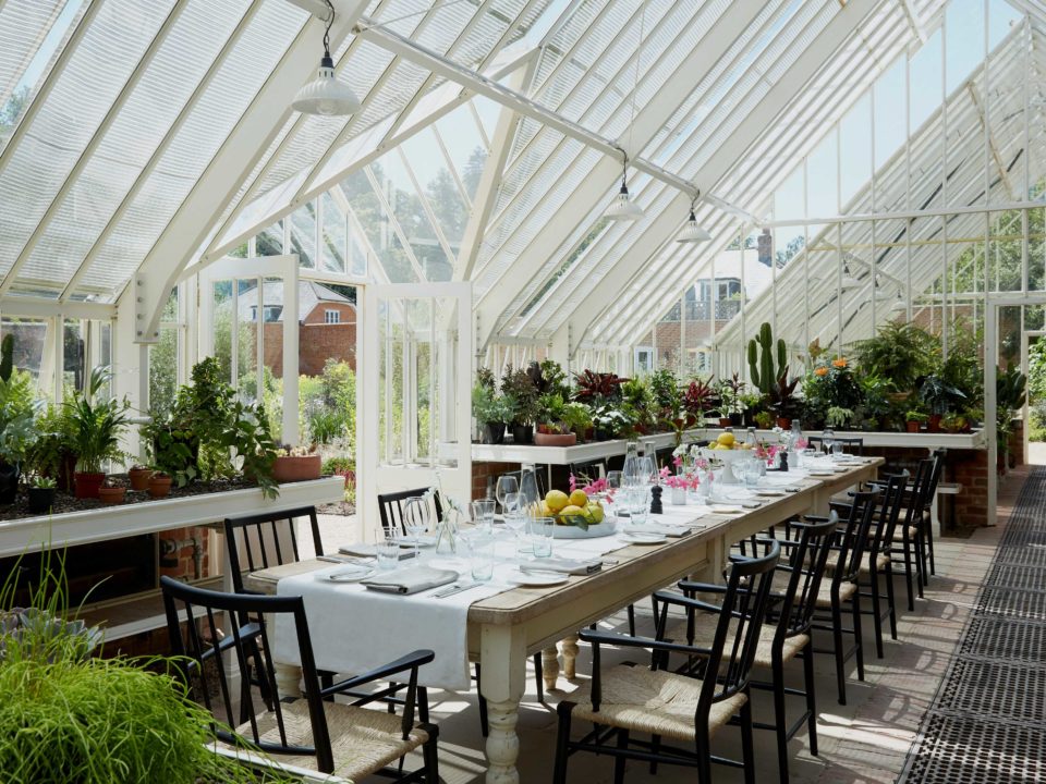 Conservatory dining table at Heckfield Place hotel, Hampshire | Mr & Mrs Smith